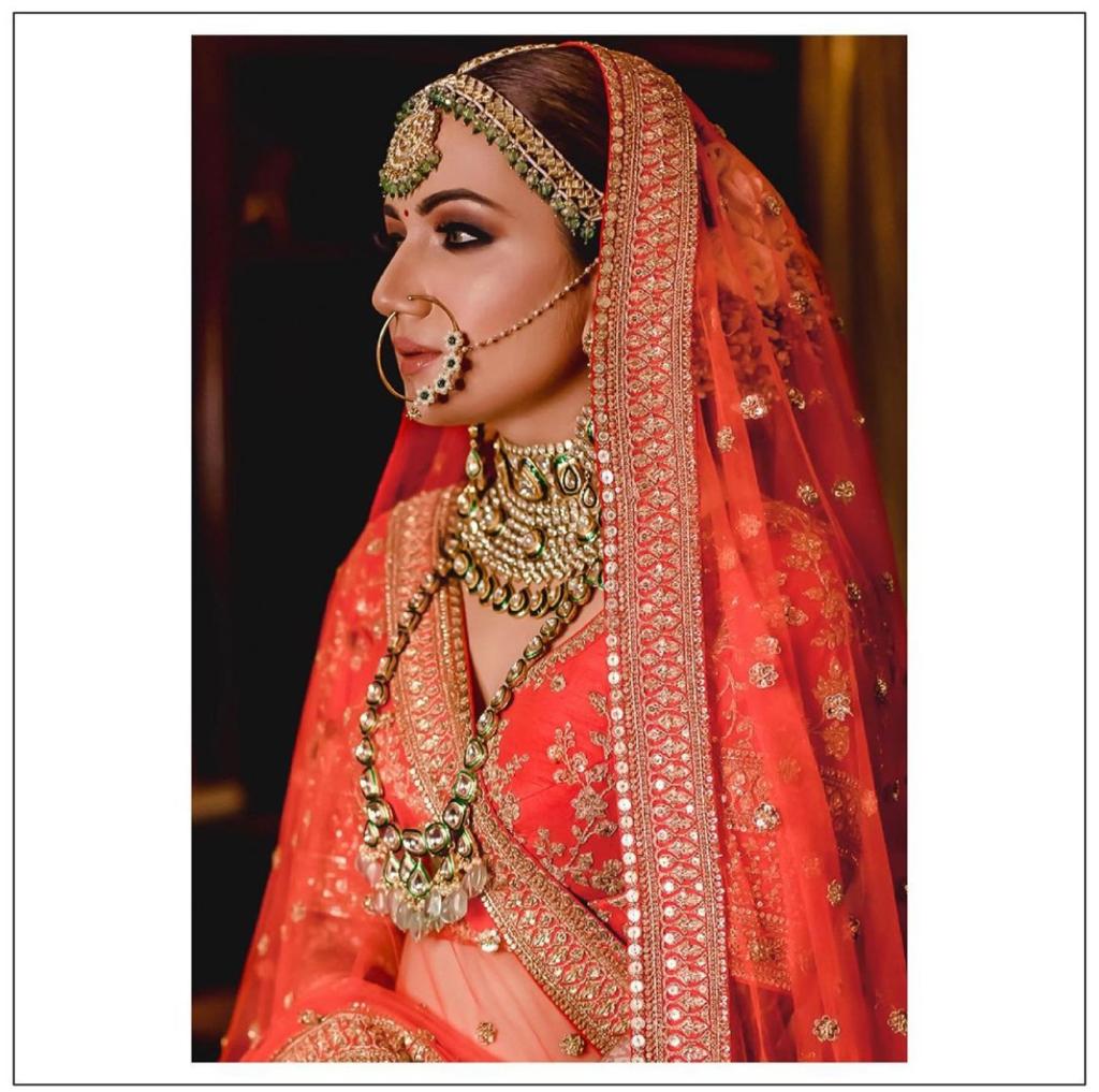 Sabyasachi orange lehenga for bride